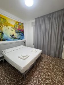Postel nebo postele na pokoji v ubytování Hotel MDP