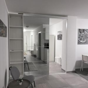 Kuchyň nebo kuchyňský kout v ubytování Modern and Cozy Apartment in Heilbronn + 17 fotografií