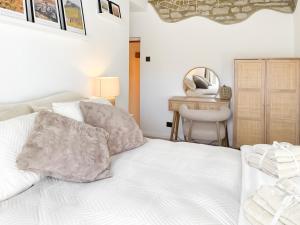 Voodi või voodid majutusasutuse Middle Cottage toas +7 fotot