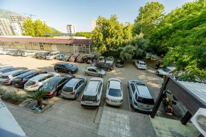 a bunch of cars parked in a parking lot at Alpha Centrum in Bar