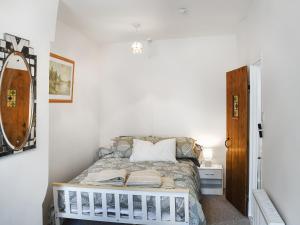 Postel nebo postele na pokoji v ubytování Seagull Cottage + 8 fotografií