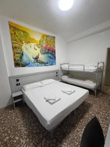 Postel nebo postele na pokoji v ubytování Hotel MDP