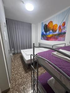 Postel nebo postele na pokoji v ubytování Hotel MDP