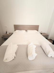 Postel nebo postele na pokoji v ubytování Noah&Chris Apartments