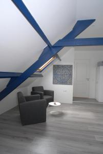 Posezení v ubytování B&B De Kaagse Boer