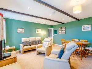 Et opholdsområde på Dovecoat Cottage