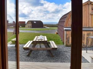 a picnic table in front of a barn at Withy Bottom-Uk1393 in Corney