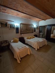a room with two beds in a room at La Crota B&B in Asti +41 photos