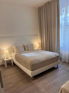 Postel nebo postele na pokoji v ubytování Maria Apartment Liben