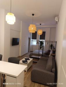 Et tv og/eller underholdning på GOA Beach Front Apartments + 20 billeder