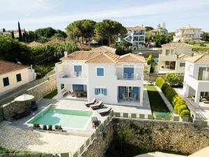 an aerial view of a villa with a swimming pool at Vasilopoulos Residences - Villa Kalliste in Argostoli