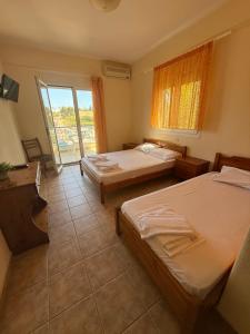 Postel nebo postele na pokoji v ubytování Hotel Giorgio