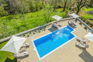 Bazén v ubytovaní Villa Manus - Boutique Apartments alebo v jeho blízkosti