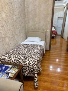 Voodi või voodid majutusasutuse Guest house Nano toas