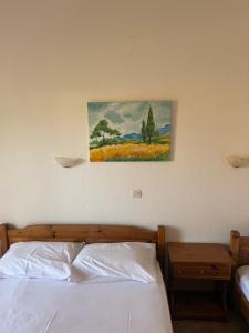 A bed or beds in a room at Hotel Giorgio