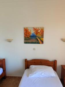A bed or beds in a room at Hotel Giorgio