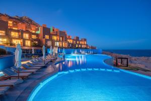 Bazén v ubytování Club Regina Los Cabos nebo v jeho okolí
