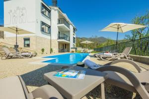 Bazén v ubytovaní Villa Manus - Boutique Apartments alebo v jeho blízkosti