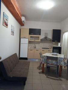 Η κουζίνα ή μικρή κουζίνα στο Deliziosa House - Schiavonea