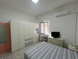 Postel nebo postele na pokoji v ubytování Giulialidohome + 24 fotografií