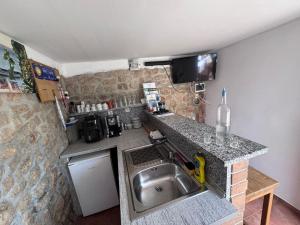 Küche/Küchenzeile in der Unterkunft Apartments & Rooms Neno