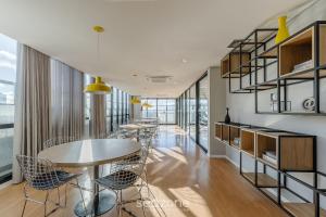 Posezení v ubytování Estadia confortável e completa no Centro de Curitiba - ECL