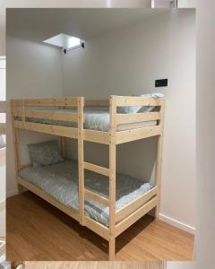 Postel nebo postele na pokoji v ubytování Casa Do Solar Castro Marim