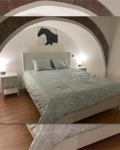 Postel nebo postele na pokoji v ubytování Casa Do Solar Castro Marim