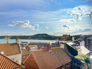 a view of a town with a river and buildings at The Anchor in Scarborough