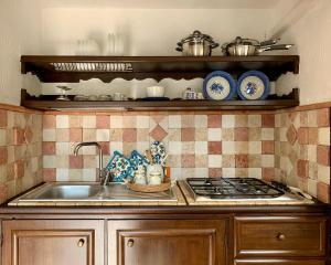 A kitchen or kitchenette at Il Calesse - Noto