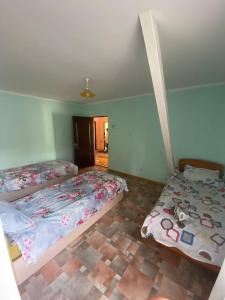Postel nebo postele na pokoji v ubytování Шанхай + 4 fotografie