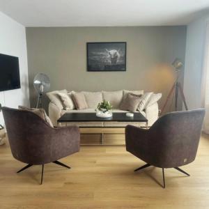 TV a/nebo společenská místnost v ubytování FACT Apartments