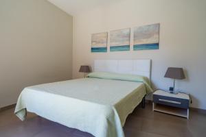 Posteľ alebo postele v izbe v ubytovaní Apartaments Lamoga- Spai