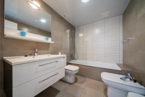 Kúpeľňa v ubytovaní Apartaments Lamoga- Spai