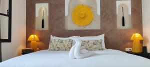 Cama ou camas em um quarto em Riad Come & Va