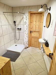 Koupelna v ubytování Apartma Pr'Komarjo + 9 fotografií