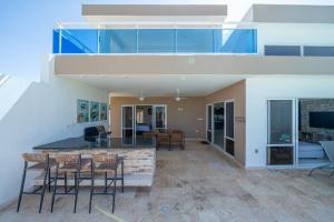 an open kitchen and living room of a house at Ocean View, Style, Freedom in Sosúa