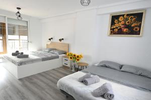 Ένα ή περισσότερα κρεβάτια σε δωμάτιο στο Victoria Apartment
