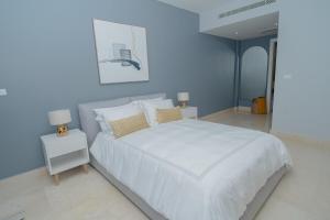 YOO, signature ocean view stay by Yourhost客房内的一张或多张床位