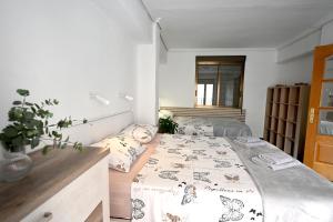 Łóżko lub łóżka w pokoju w obiekcie Playa Bonita Apartment