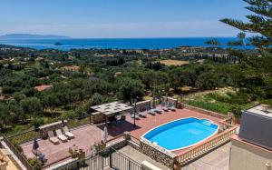 an image of a swimming pool on top of a house at Kefalonian 360° Sunrise in Kaligata
