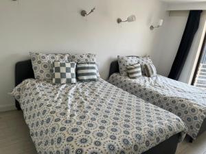 Ένα ή περισσότερα κρεβάτια σε δωμάτιο στο Apartment Coast +5 φωτογραφίες