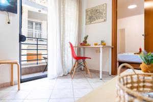 Khu vực ghế ngồi tại Rosso City Centre Apartment