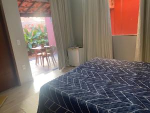 Ένα ή περισσότερα κρεβάτια σε δωμάτιο στο Aconchego do mar