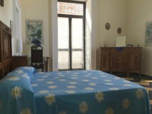 Ένα ή περισσότερα κρεβάτια σε δωμάτιο στο Casa Piclò