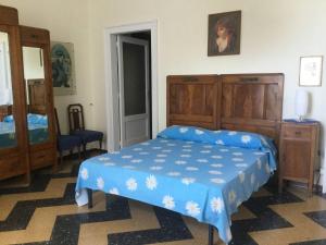 Ένα ή περισσότερα κρεβάτια σε δωμάτιο στο Casa Piclò