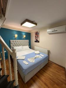 En eller flere senge i et værelse på Linden Houses