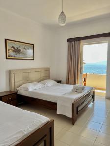 Postel nebo postele na pokoji v ubytování Beachside Coral Nest