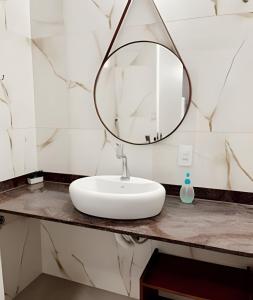 Et badeværelse på Flat Ancora 202-A Vista maravilhosa do mar