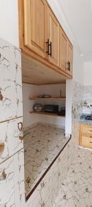 Η κουζίνα ή μικρή κουζίνα στο Super appartement familial chez hamza oualidia